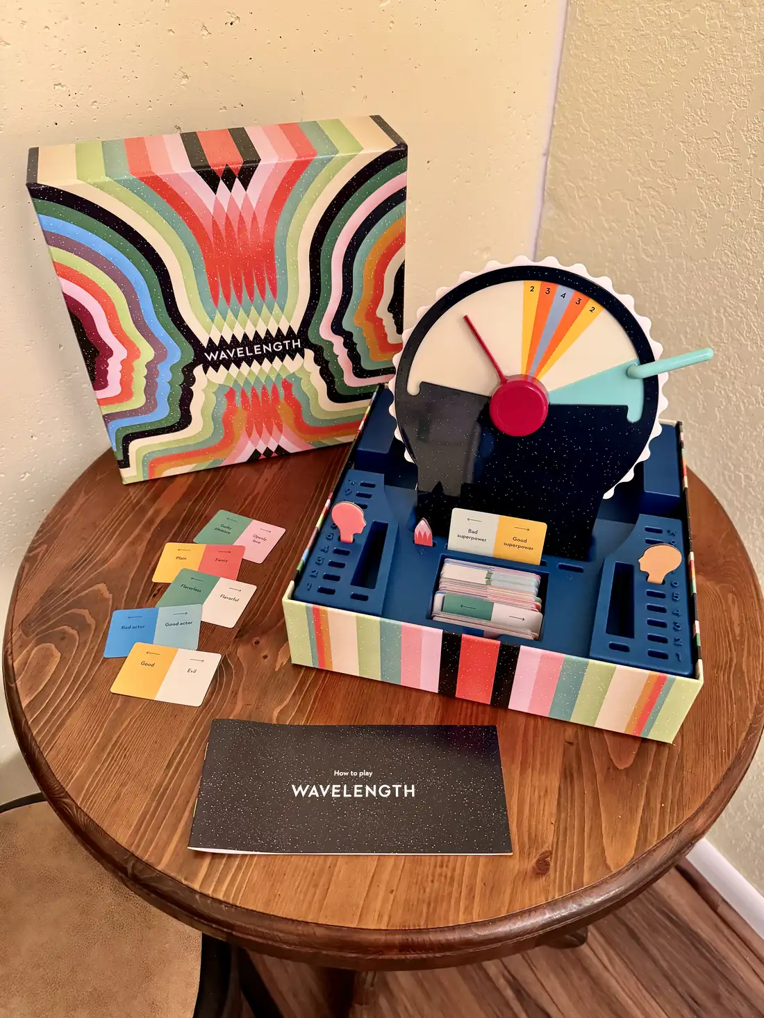 Wavelength physical wheel with scoring zones, spectrum cards, box insert, and rulebook
